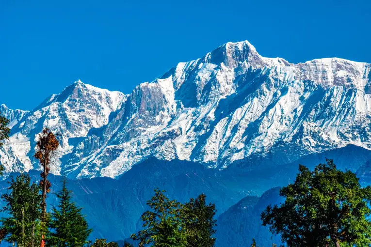 Breathtaking view of snow covered peaks in the Himalayas from Chopta India