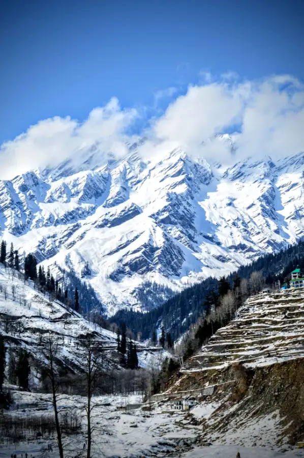 Stunning winter landscape of the snow capped Himalayas near Manali Himachal Pradesh India